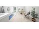 A bright and airy office space provides a desk, chair, and calming decor at 2179 S Bannock St, Denver, CO 80223