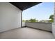 This patio provides a blank canvas for outdoor enjoyment, featuring durable flooring and a minimalist design at 2179 S Bannock St, Denver, CO 80223