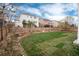 Well-maintained backyard featuring a lush lawn and a newly installed fence at 7844 Grady Cir, Castle Rock, CO 80108