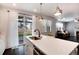 Kitchen with quartz countertops, stainless steel appliances, and a sliding door leading to the backyard at 7844 Grady Cir, Castle Rock, CO 80108