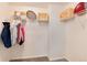Organized walk-in closet with shelving and hanging racks for efficient storage and organization at 7844 Grady Cir, Castle Rock, CO 80108