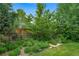 Beautiful backyard showcasing lush greenery and a well-maintained garden area at 16309 Hedgeway Dr, Parker, CO 80134