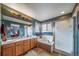Bathroom features a double sink vanity, a large tub, and a shower at 16309 Hedgeway Dr, Parker, CO 80134