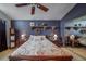 Charming bedroom features a floral bedspread, bedside tables, and mirrored closet at 16309 Hedgeway Dr, Parker, CO 80134