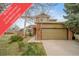 Charming two-story home with a two-car garage, beautiful trees, and manicured landscaping at 16309 Hedgeway Dr, Parker, CO 80134