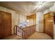 Hallway upstairs with neutral carpeting, and wood doors accessing other rooms at 16309 Hedgeway Dr, Parker, CO 80134