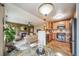 Bright kitchen and living area with stainless steel appliances and natural light at 16309 Hedgeway Dr, Parker, CO 80134
