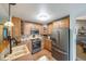 Updated kitchen featuring stainless steel appliances and light wood cabinetry at 16309 Hedgeway Dr, Parker, CO 80134