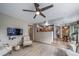 Open-concept living room with a view to the kitchen and dining area at 16309 Hedgeway Dr, Parker, CO 80134