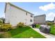Well-maintained backyard with a patio, lush lawn, and manicured landscaping; ideal for outdoor living at 12845 Park Creek Way Way, Firestone, CO 80504