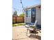 Inviting patio with string lights, a fenced yard, and a cozy seating area at 190 S Canosa Ct, Denver, CO 80219
