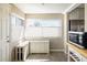 Bright breakfast nook with plenty of light and built in cabinets at 190 S Canosa Ct, Denver, CO 80219