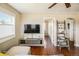 Bright living room with hardwood floors, a large window, and modern decor at 190 S Canosa Ct, Denver, CO 80219