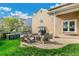 Backyard with patio area, fire pit, and outdoor seating at 6340 E Costilla Pl, Centennial, CO 80112
