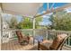 Covered outdoor balcony with seating and a view at 6340 E Costilla Pl, Centennial, CO 80112