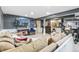 Finished basement featuring a bar area, entertainment setup, and workout equipment for versatile use at 6340 E Costilla Pl, Centennial, CO 80112