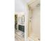 Bathroom with tiled walk-in shower, sleek glass doors, and a stylish vanity at 6340 E Costilla Pl, Centennial, CO 80112