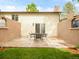Backyard patio with fenced yard and grassy space at 3914 E 116Th Pl, Thornton, CO 80233