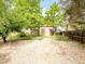 Large backyard with space for activities and a mix of grass and gravel at 3914 E 116Th Pl, Thornton, CO 80233