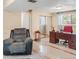 Finished basement with an office area and comfortable armchair at 3914 E 116Th Pl, Thornton, CO 80233