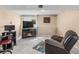 Finished basement with comfortable seating, fireplace and TV at 3914 E 116Th Pl, Thornton, CO 80233