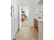 Bathroom with tiled floors, double sinks and a view to the bedroom at 19834 W 56Th Pl, Golden, CO 80403