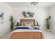 Comfortable bedroom with stylish decor and ample natural light at 19834 W 56Th Pl, Golden, CO 80403