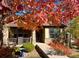 Lovely single-story home boasting a stone facade, a cozy covered porch, and mature landscaping at 19834 W 56Th Pl, Golden, CO 80403