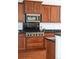 Gourmet kitchen features stainless steel appliances and granite countertops at 19834 W 56Th Pl, Golden, CO 80403