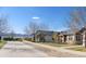 A quiet street view of homes with sidewalks and trees in a well-maintained neighborhood at 19834 W 56Th Pl, Golden, CO 80403