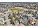 Spacious neighborhood aerial view showcases nearby school and green athletic field at 6651 Yale Dr, Highlands Ranch, CO 80130