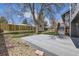 Well-maintained backyard with a spacious deck, stone landscaping, and a wood fence for privacy at 145 S Buchanan Ave, Louisville, CO 80027