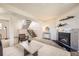 Finished basement with fireplace, stairs to the main level, and a comfortable seating area at 145 S Buchanan Ave, Louisville, CO 80027