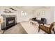 Finished basement with fireplace, comfortable sofa, and accent chair is perfect for relaxing or entertaining at 145 S Buchanan Ave, Louisville, CO 80027