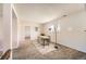 Finished basement area featuring a desk, window, and stairs to the upper level is versatile and functional at 145 S Buchanan Ave, Louisville, CO 80027