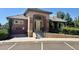 Community recreation center building featuring a welcoming entrance, steps, and well-maintained landscaping at 12054 E Lake Cir, Greenwood Village, CO 80111