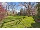 Spacious backyard with mature trees offering lots of shade at 4 Brookside Dr, Greenwood Village, CO 80121