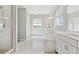 Beautiful bathroom featuring a soaking tub with white tile surround and a shower with glass enclosure at 3038 Blithe Pt, Castle Rock, CO 80108