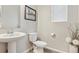 Powder room featuring modern fixtures, decor, and natural light at 3038 Blithe Pt, Castle Rock, CO 80108