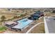 Enjoy the community pool area with lounge chairs, tables, and a shaded structure for relaxing by the water at 3038 Blithe Pt, Castle Rock, CO 80108