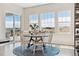 Eat-in dining area with views, showing a round table and chairs situated on a modern area rug at 3038 Blithe Pt, Castle Rock, CO 80108
