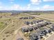 An aerial view of a well-planned community showcasing modern homes and streetscapes at 3038 Blithe Pt, Castle Rock, CO 80108