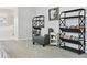 Cozy sitting area with bookshelves and a chair, creating a nice spot for reading or relaxation at 3038 Blithe Pt, Castle Rock, CO 80108
