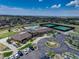 Community clubhouse with pool, tennis courts and parking at 8901 S Ukraine Ct, Aurora, CO 80016