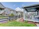 Landscaped backyard with a covered patio at 8901 S Ukraine Ct, Aurora, CO 80016