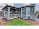 Covered patio with a spacious deck and landscaping at 8901 S Ukraine Ct, Aurora, CO 80016