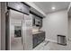 Basement kitchenette with stainless steel appliances at 8901 S Ukraine Ct, Aurora, CO 80016