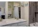 Main bathroom with double sinks and a bathtub at 8901 S Ukraine Ct, Aurora, CO 80016