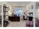 Home office features built-in shelving and large window at 8901 S Ukraine Ct, Aurora, CO 80016