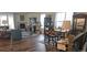 Spacious living room features hardwood floors and a fireplace at 8901 S Ukraine Ct, Aurora, CO 80016